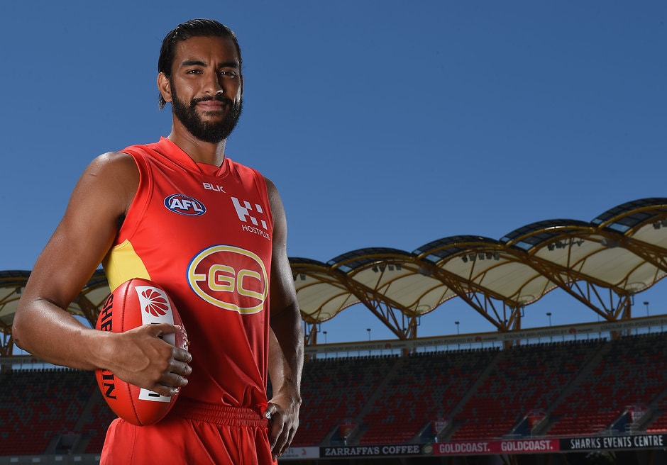 AFL 2016 Portraits - Gold Coast Suns GOLD COAST, AUSTRALIA - FEBRUARY 26: Tom Nicholls of the Suns poses for a photo during the Gold Coast Suns portrait session at Metricon Stadium in the Gold Coast, Australia on February 26, 2016. (Photo by Matt Roberts/AFL Media)